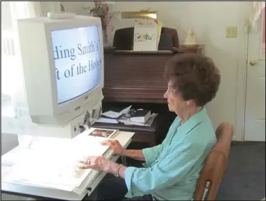  ?? Submitted by Bill Charles ?? Christine Grover uses her magnifying machine to study lessons, read mail, or memorize songs.