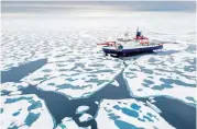  ??  ?? The Polarstern research ship makes its way through Arctic sea ice in August. Steffen Graupner/ Mosaic via © The New York Times Co.