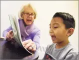  ?? Hearst Connecticu­t Media file photo ?? Pat Young tutors Charles Cajas at Family Centers’ Family First in Education program at the YMCA Early Learning Center in Greenwich on Jan. 29, 2019. It is one of the many programs run by Family Centers, a partner in the Giving Fund.