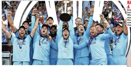  ?? Pictures: TOM JENKINS and PAUL CHILDS ?? RAISING A SMILE Eoin Morgan hoists the World Cup aloft after the final win over New Zealand