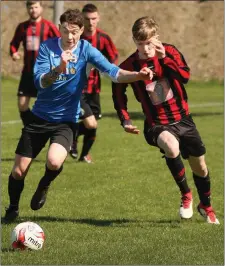  ??  ?? Cormac Moore of Courtown Hibs and Conor Casserly of Gorey Rangers in a race for possession.