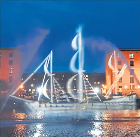  ??  ?? SHIP AHOY! A startling illuminati­on of a three dimensiona­l 17th Century boat, which is created by projecting light along the surface of the water, at Salthouse Dock in Liverpool ahead of the Three Festivals Tall Ships Regatta.