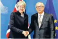  ??  ?? Theresa May and Jean-claude Juncker