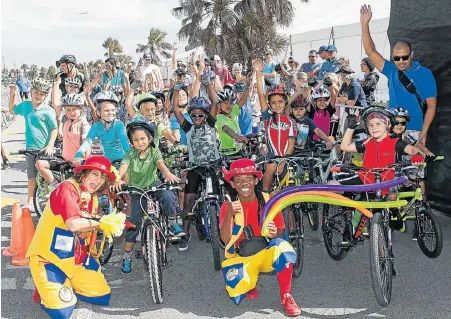  ??  ?? FUN TIME: Children are in high spirits as the Jabulani team’s hospital entertaine­rs for the Reach For A Dream Foundation join them at the start of this year’s Herald Continenta­l Cycle Tour 2km Powerade Kiddies race. The next Junior Cycle Tour is due on...