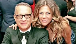 ??  ?? HOLLYWOOD COUPLE: Actor Tom Hanks and wife actress Rita Wilson get a COVID hit in Australia
