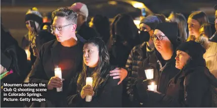  ?? Picture: Getty Images ?? Mourners outside the Club Q shooting scene in Colorado Springs.