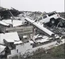  ?? (Photo AFP) ?? Un bâtiment dévasté dans la ville de Rockport.