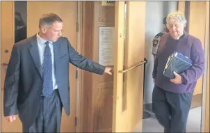  ?? CAPE BRETON POST PHOTO ?? John Whalley, left, former economic developmen­t officer with the Cape Breton Regional Municipali­ty, and his lawyer, Blair Mitchell, leave a Sydney courtroom Monday where a judge has begun hearing evidence in a wrongful dismissal suit filed by Whalley