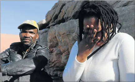  ?? Pictures: RIAAN MARAIS ?? TIME OF GRIEF: Feziwe Sinekelo breaks down while talking about her brother, Zamikhaya, who is still missing. Wellington Dlamini’s brother, Sihle, is also among the seven fishermen who are still missing.