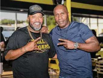  ?? Mark Champion/Flint Field TX ?? Bun B, left, of rap duo UGK, hangs out with Willie D of the Geto Boys at Trill Burgers.