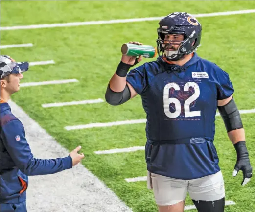 ?? ASHLEE REZIN/SUN-TIMES ?? New Bears center Lucas Patrick said it’s unfair to compare Justin Fields to Aaron Rodgers. “It’s like comparing an apple to an orange,” he said.