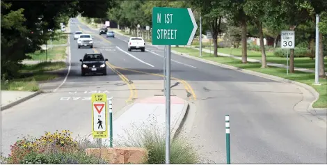  ?? JENNY SPARKS/LOVELAND REPORTER-HERALD ?? Drivers travel on north First Street near the roundabout on Mountain Avenue Wednesday, Sept. 14, 2022, in Berthoud.