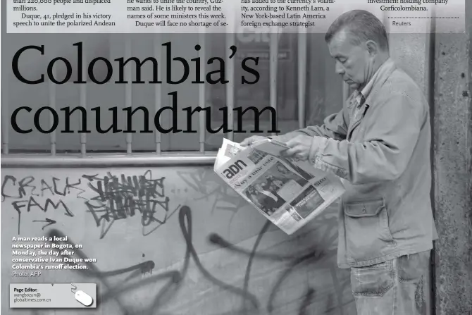  ?? Photo: AFP ?? A man reads a local newspaper in Bogota, on Monday, the day after conservati­ve Ivan Duque won Colombia’s runoff election.