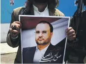 ?? EPA ?? A portrait of the senior Houthi leader Saleh Al Sammad, during a rally against his killing in a Saudi-led air strike, in Sanaa, Yemen