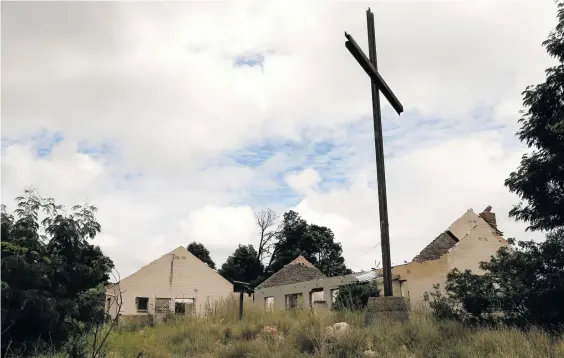  ?? ?? The ruins of what was once the main house and offices of the Wilgesprui­t Fellowship Centre, which were demolished by the property developers as part of their plan to make way for upmarket residentia­l housing. Photo: Felix Dlangamand­la