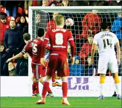  ??  ?? TIMED TO PERFECTION: Dave Nugent scores his last-gasp header