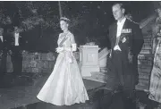  ??  ?? Queen Elizabeth II and Prince Philip in Brisbane.