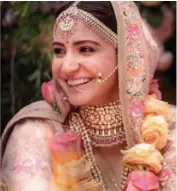  ??  ?? Actress Anushka Sharma sporting Sabyasachi jewellery during her wedding