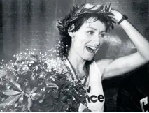  ?? Photo / Getty Images ?? Lorraine Moller laps up the attention after winning the 1984 Boston Marathon and announcing herself to the world.