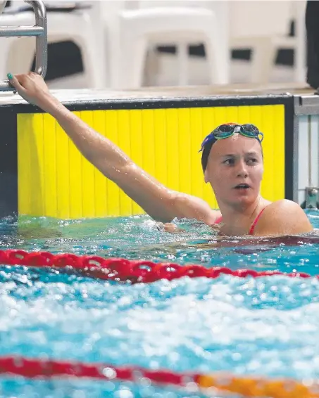  ?? Picture: AAP IMAGE ?? Ariarne Titmus celebrates her 800m victory last night, edging closer to a showdown with her swimming enemy.