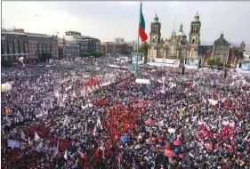  ?? THE ASSOCIATED PRESS ?? Supporters of the ruling party presidenti­al candidate Claudia Sheinbaum fill the Zocalo during her opening campaign rally in Mexico City, earlier in March.