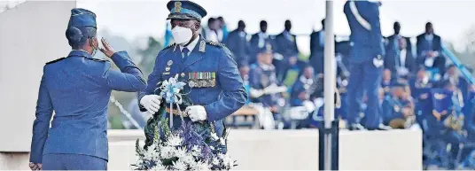 ?? | THOBILE MATHONSI African News Agency (ANA) ?? CHIEF of the Air Force, Lieutenant General Wiseman Mbambo lays a wreath during the memorial service of the fallen heroes and heroines of the South African Air Force members who departed while active in the service, hosted yesterday at Bays Hill Memorial site.
