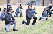  ??  ?? Chief Constable Alan Pughsley, of Kent Police, takes the knee at a Black Lives Matter event