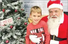  ?? Photograph courtesy of Pea Ridge Bright Futures ?? Children enjoyed breakfast and visits with Santa Saturday, Dec. 15, thanks to Bright Futures, Pea Ridge.