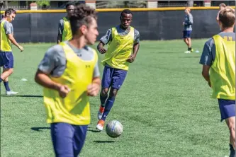  ?? Cory Rubin/The Signal (See additional photos on signalscv.com) ?? The Master’s University’s Benji Tembo dribbles the ball in practice at The Master’s University in Newhall on Wednesday. Tembo is originally from Malawi, a country in Africa.