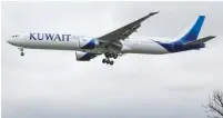  ?? (Wikimedia Commons) ?? A KUWAIT AIRWAYS Boeing 777-300ER on its final approach to Heathrow Airport.