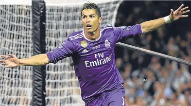  ?? Getty. ?? Cristiano Ronaldo celebrates scoring in the Champions League final win against Juventus.