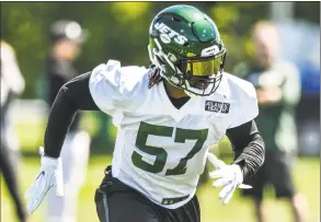  ?? Mark Brown / Getty Images ?? Jets linebacker C.J. Mosley participat­es in drills during minicamp on Saturday in Florham Park, N.J.