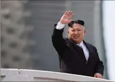  ?? ASSOCIATED PRESS ?? NORTH KOREAN LEADER Kim Jong-Un waves during a military parade on April 15 in Pyongyang, North Korea.