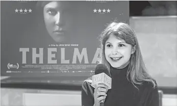  ??  ?? Cast member Eili Harboe (also below) speaks at a press conference for ‘Thelma’. • (Below left) Poster for ‘Thelma’.