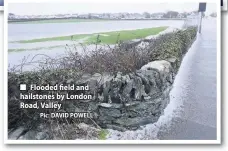  ?? Pic: DAVID POWELL ?? ■ Flooded field and hailstones by London Road, Valley