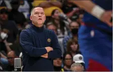  ?? AARON ONTIVEROZ — THE DENVER POST ?? Denver Nuggets head coach Michael Malone watches the action against the Oklahoma City Thunder during the fourth quarter of Denver’s 122117 win on Saturday, October 22, 2022.