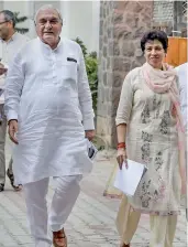  ?? — PTI ?? Haryana Congress chief Kumari Selja and Congress CLP leader in Haryana Bhupinder Singh Hooda come out after meeting the Election Commission of India at Nirvachan Sadan in New Delhi on Tuesday.