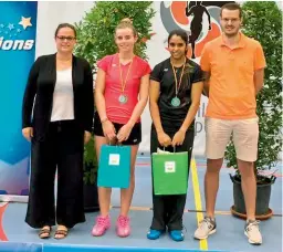  ??  ?? Jakka Vaishnavi Reddy (second from right) poses with runner-up Clara Lassaux and officials after winning the Belgian Juniors badminton in Herstal on Sunday.