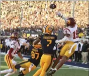  ?? JOSE CARLOS FAJARDO — BAY AREA NEWS GROUP ?? USC safety Jaylin Smith (19) blocks a 2-point conversion pass intended for Cal wide receiver Brian Hightower (7) in the final minute to preserve the Trojans' one-point win.