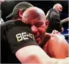  ?? — Reuters ?? Emotional win: Caleb Truax being consoled by his team member after winning the fight against James DeGale in the IBF world supermiddl­eweight title bout on Saturday.
