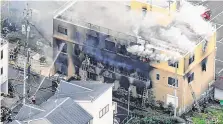  ?? PHOTO: KYODO NEWS, VIA AP ?? Terror: Smoke billows from a three-storey building of Kyoto Animation in western Japan yesterday.