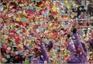  ?? YUKI IWAMURA — THE ASSOCIATED PRESS ?? Confetti is released during a confetti test ahead of New Year’s Eve in Times Square on Friday.