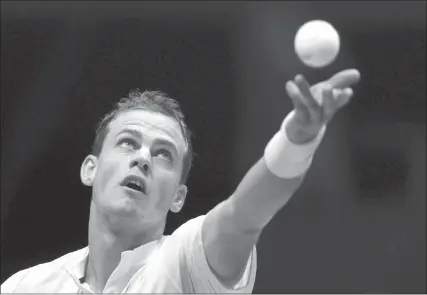  ?? The Associated Press ?? Canada’s Vasek Pospisil serves during a Davis Cup semifinal match in Madrid, Spain, on Nov. 23.