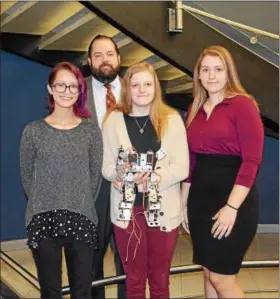  ?? SUBMITTED ?? Project Lead the Way Engineerin­g Instructor Brian Iselin and students from left: Soleil Piros, Lindsey Wood and Megan Gregg