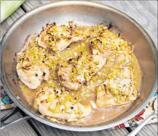  ?? AP PHOTO/MELISSA D’ARABIAN ?? This Sept. 18 photo shows quick skillet chicken with leeks in Bethesda, Md.