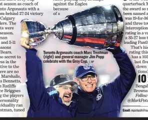  ?? | AP ?? Toronto Argonauts coach Marc Trestman ( right) and general manager Jim Popp celebrate with the Grey Cup.