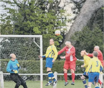  ??  ?? Grindon Broadway O40s (yellow) in action against Hylton CW at Herrington CW Welfare Park.