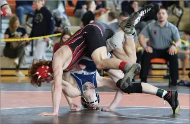  ?? AUSTIN HERTZOG - MEDIANEWS GROUP ?? Spring-Ford’s Cole Smith and Boyertown’s Luke Heimbach tangle in the 114-pound final at the District 1-3A North tournament on Feb. 25 at Perkiomen Valley.