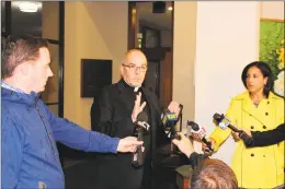  ?? John Kovach / Hearst Connecticu­t Media ?? The Rev. Robert Kinnally of St. Aloysius Church in New Canaan addresses the media Thursday before a prayer vigil for Jennifer Dulos, the 50-year-old mother of five who has been missing since May 24.