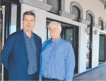  ?? MOMENTUM: Housing Industry Associatio­n principal economist Tim Reardon and North Queensland director John Futer in Townsville. ??